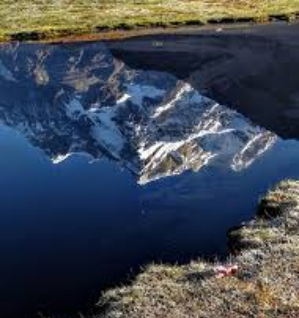 Deoria Tal lake with Chaukhamba reflection in Uttarakhand