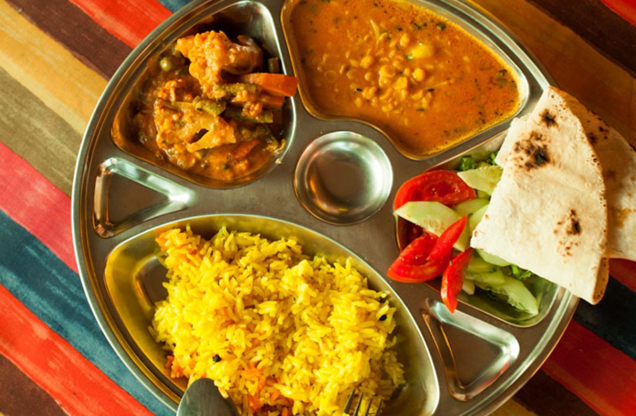 Ayurvedic sattvic meals with dosha-specific herbs for yoga retreat nourishment