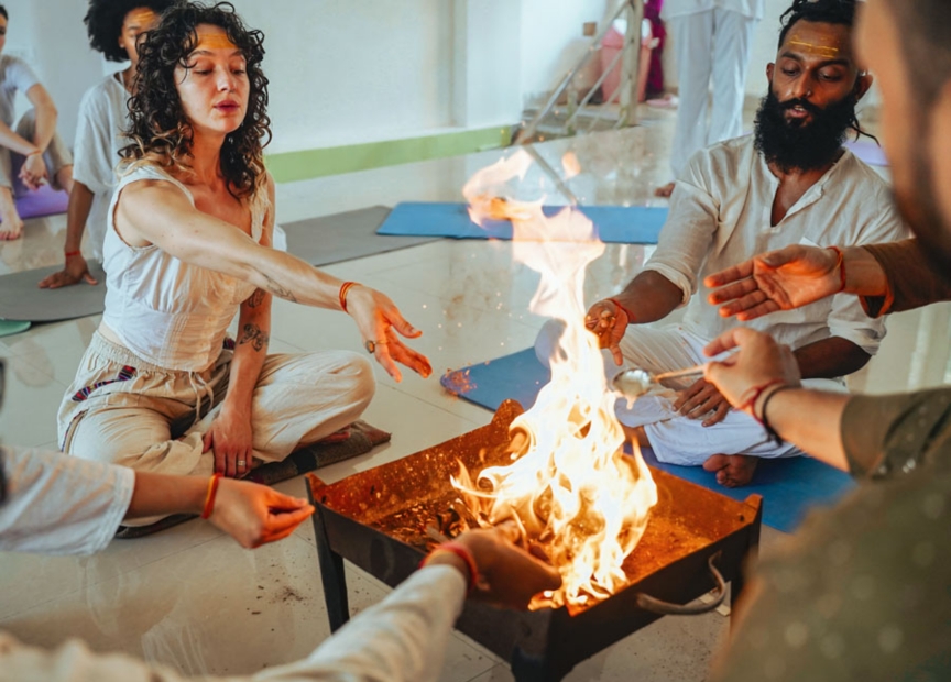 Yoga activity scene amidst majestic Himalayan mountains at Adishesh Retreat