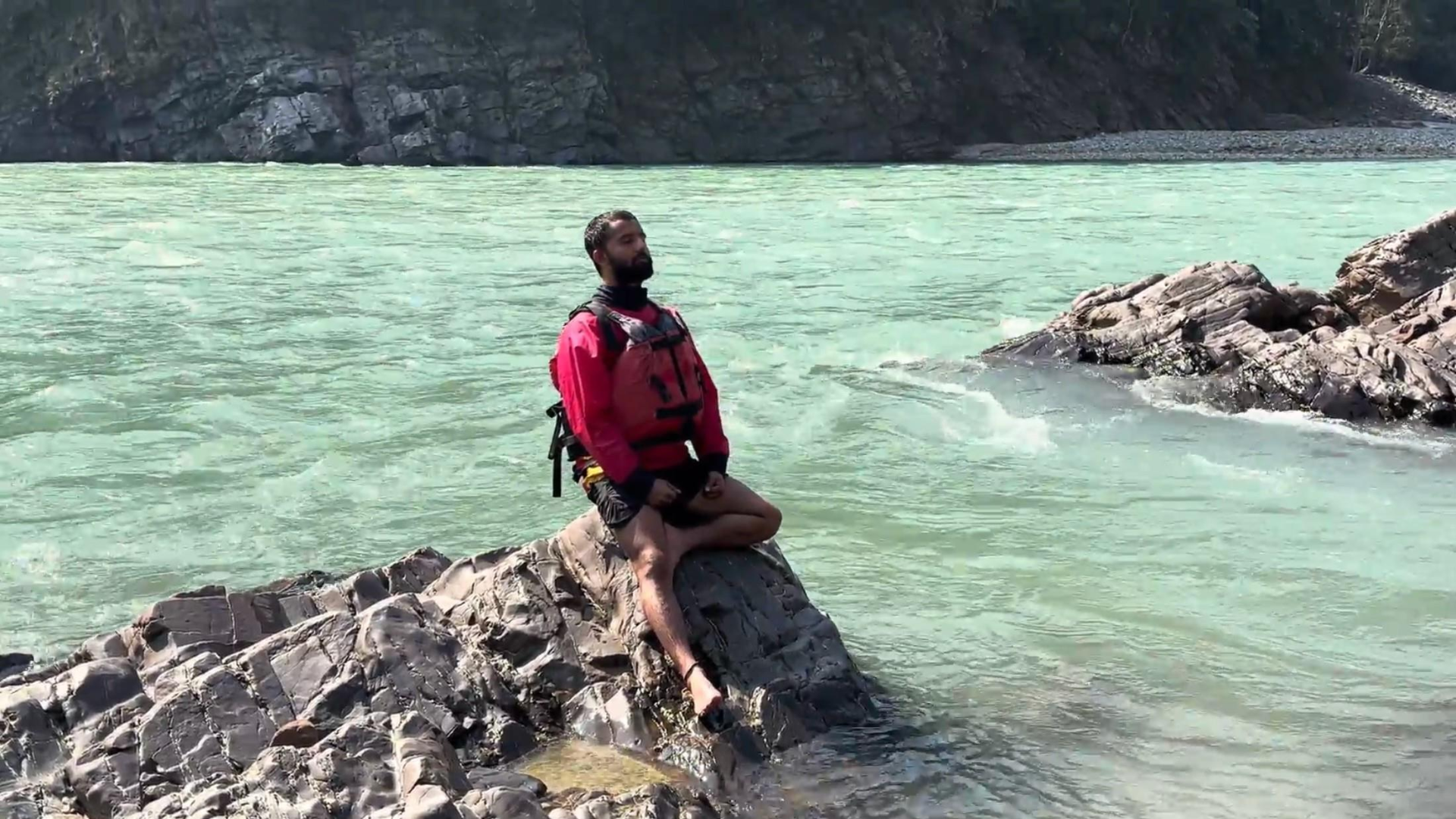 Meditation near Alaknanda River during Himalayan yoga retreat