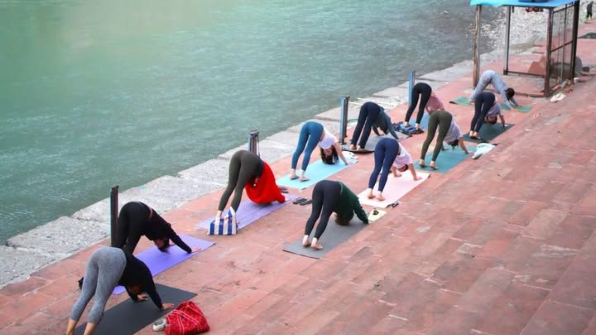 Yoga retreat group watching Ganga Aarti in Rishikesh