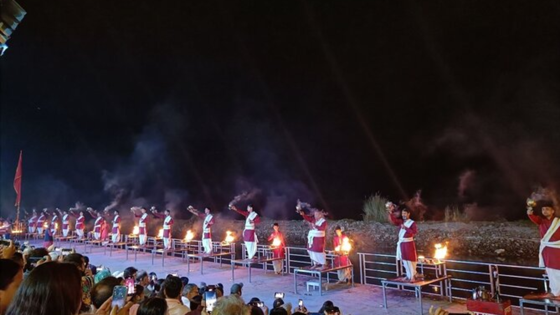 Yoga retreat group enjoying evening Ganga Aarti at Triveni Ghat