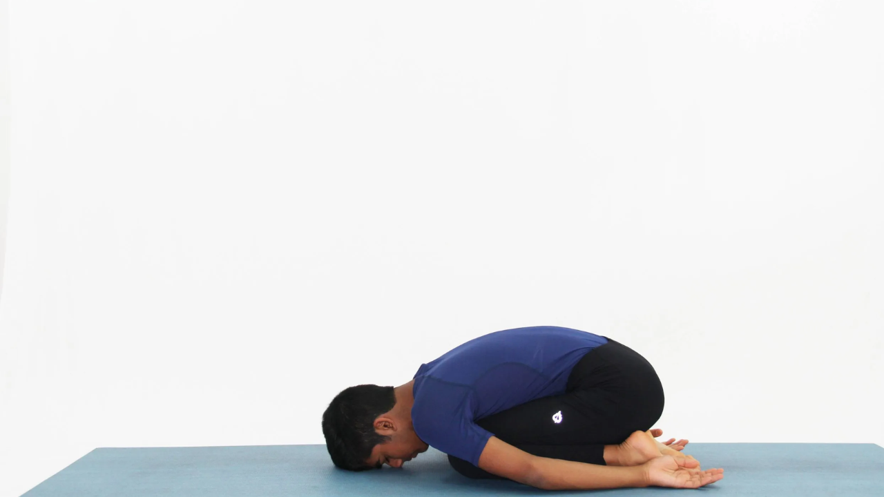 Beginner practicing Child’s Pose Balasana during a calming Hatha Yoga session