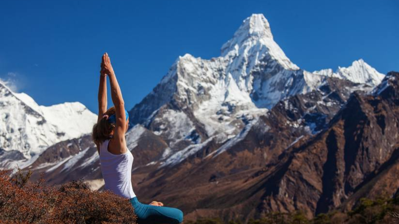 9-Day Himalayan Hiking Yoga Retreat in Rishikesh with students practicing yoga and hiking in the mountains