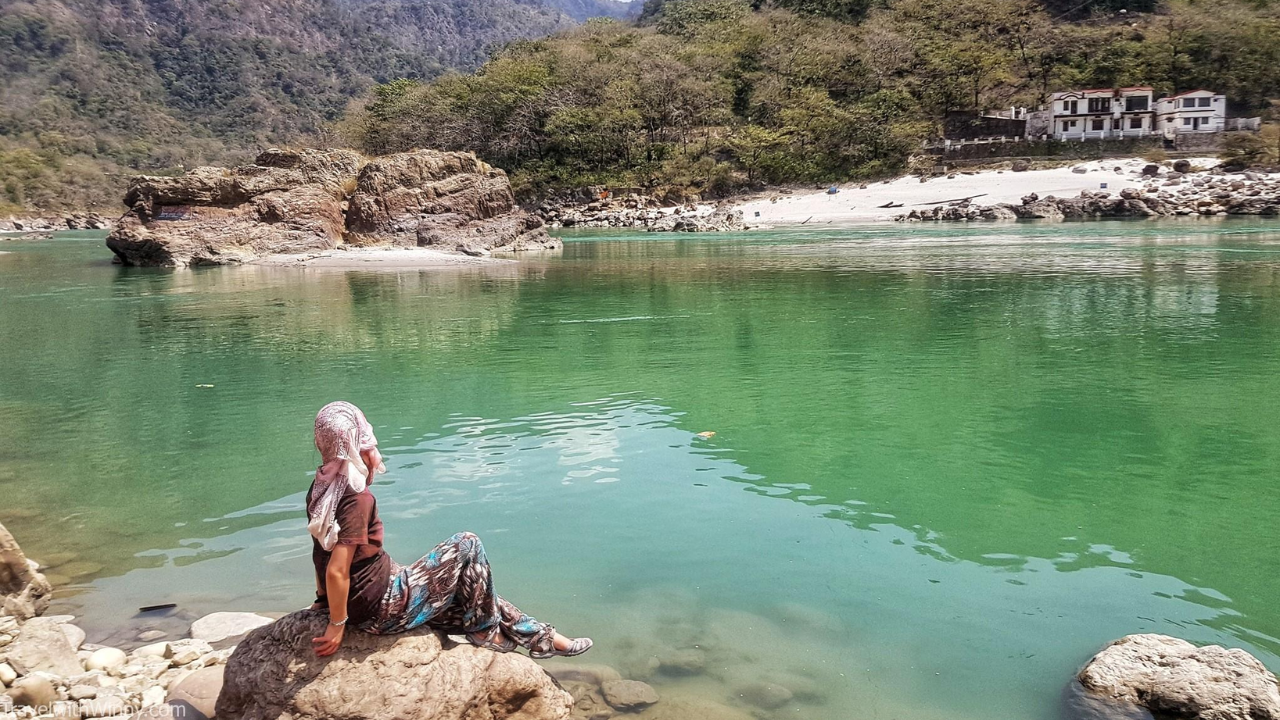 Morning view of Rishikesh with the Ganges river and Himalayan mountains perfect setting for solo yoga retreat