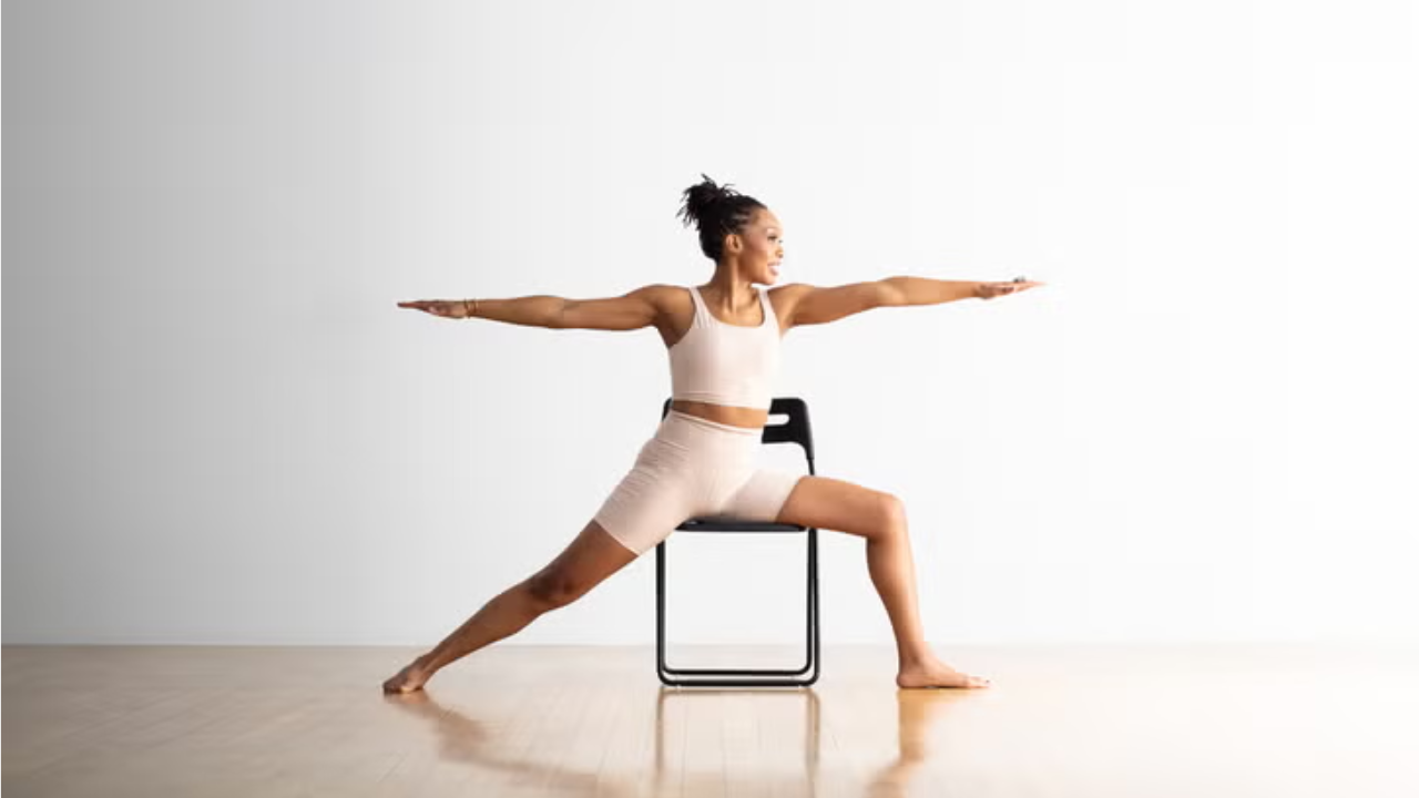 Dynamic Warrior II pose illustrating lower body toning and flexibility in weight loss yoga