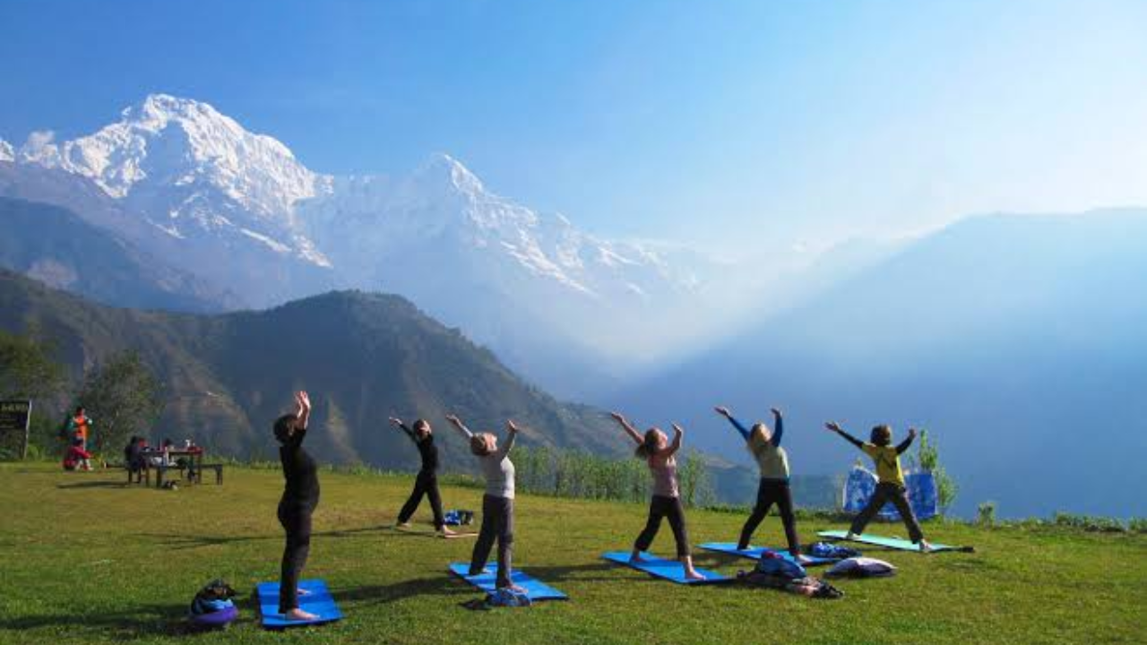 Yoga session at an outdoor Himalayan camp during the Rishikesh hiking yoga retreat